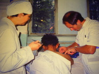 Robin Costello treating a shoulder problem in Kunming Hospital, China